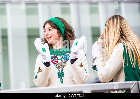 Montreal, Canada - March 17 2024： People celebrating the Saint Patrick`s Day Parade in Montreal downtown Stock Photo